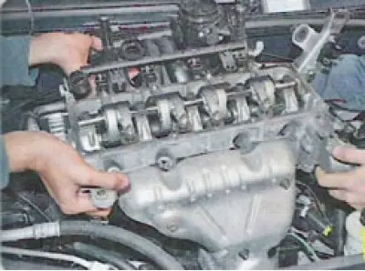 Please note that the bolts are of different lengths. When removing them, remember the location of…