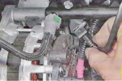 7. Remove the air filter housing (see here).