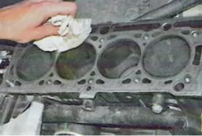 18. Remove the cylinder head gasket.