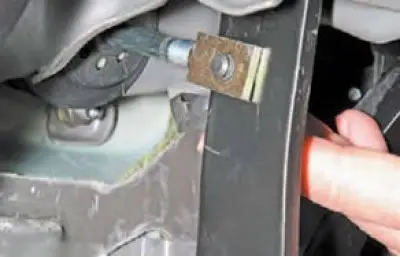... disconnect the vacuum booster from the brake pedal by turning the spring retainer of the finger…