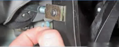 use a screwdriver to pry off the plastic retaining ring