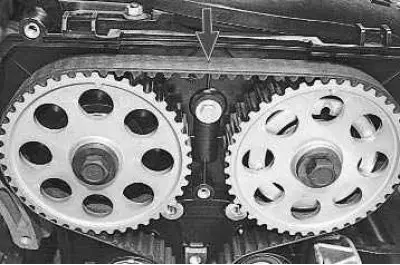 3. Check the tension of the timing belt by pressing your finger with a force of 100 N (10 kgf) on…