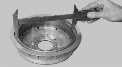 9. Measure the diameter of the working surface of the brake drum. If it is more than acceptable…