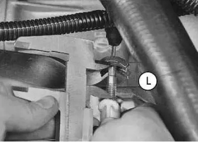 1. Set the clutch release cable to its original position by overcoming the force of the mechanism…