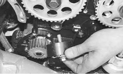 16. To replace the roller, before installing the belt, completely unscrew its mounting bolt and…