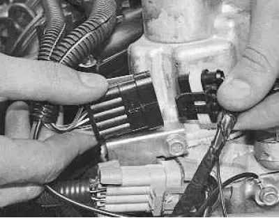 1. Disconnect the ignition coil wiring harness connectors…