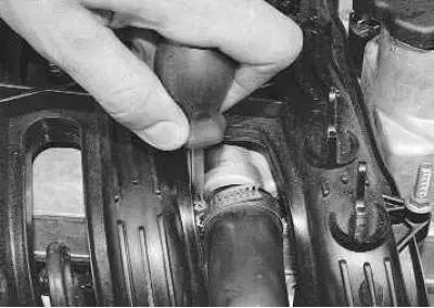 7. Loosen the clamp..