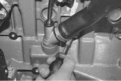 9. Loosen the clamp..