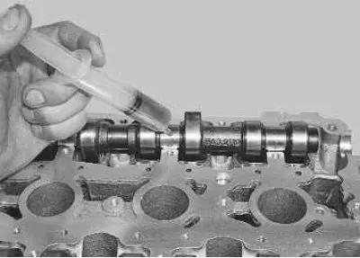 27. Lubricate the journals with engine oil…