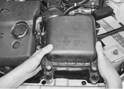 10. …and remove the air filter assembly with the air intake pipe.
