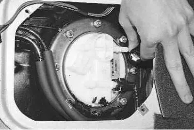 3. …and disconnect the fuel line from the pump fitting.