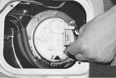 4. Press the spring lock…