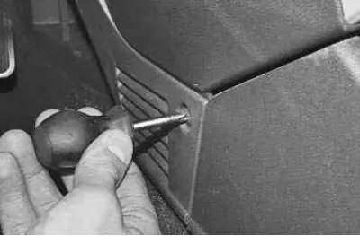 2. Remove the screws securing the left and right screens…