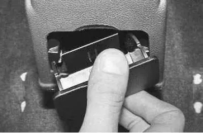 13. …and remove the rear ashtray.