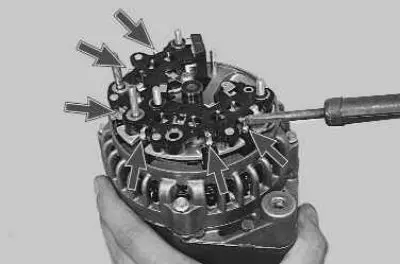 5. Unsolder the six terminals of the stator winding...