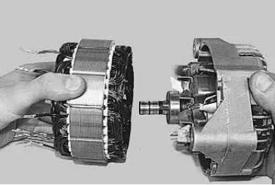 15. Remove the stator from the cover.