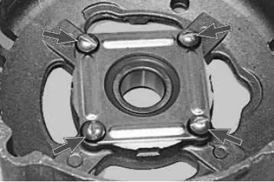 22. To replace the bearing or cover, remove the four screws securing the bearing thrust washer...
