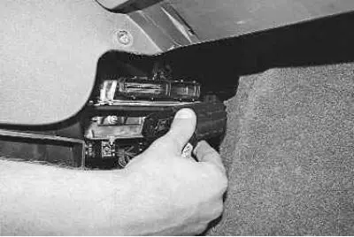 4. Disconnect the wiring harness from the ECU.