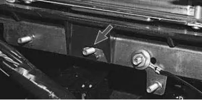 Note: On the opposite side, the ECU bracket is not secured with a nut.