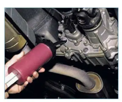 If there is a normal amount of oil in the transfer case, its level should reach the bottom edge of…