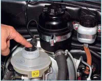To check the fluid level sensor, turn on the ignition...